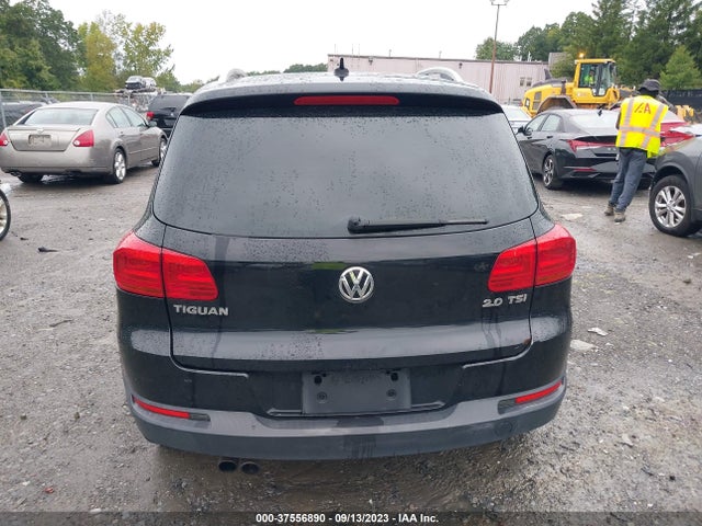 2012 VOLKSWAGEN TIGUAN SE W/SUNROOF & NAV VIN: WVGAV7AX7CW563957
