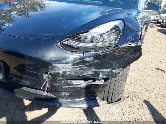 2018 Tesla 3, VIN: 5YJ3E1EB4JF103309