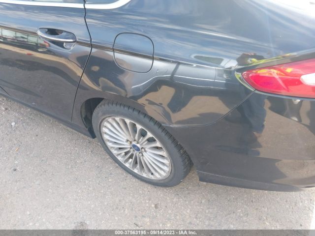 3FA6P0RUXER172660 Ford Fusion Titanium Hybrid