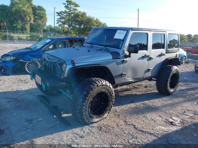 1C4BJWEG5EL102723 Jeep Wrangler Unlimited Sahara