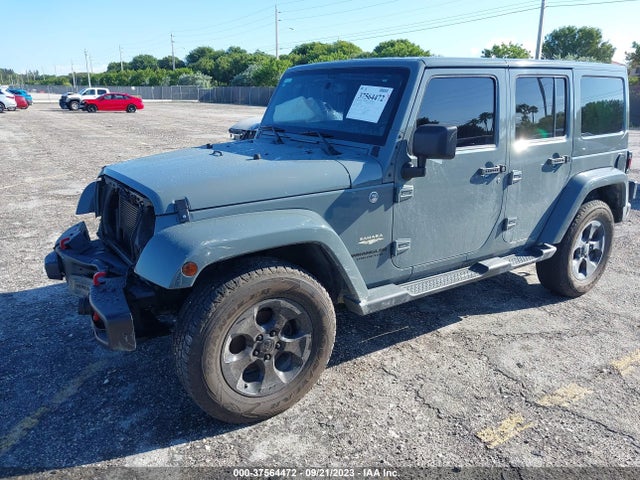 2014 JEEP WRANGLER UNLIMITED SAHARA VIN: 1C4HJWEG3EL116565