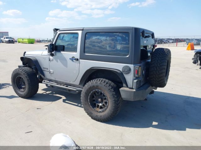 1C4AJWAG5GL224969 Jeep Wrangler Sport