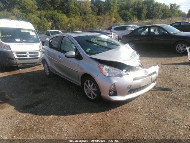 Toyota Prius C One/three/two/four 2014 JTDKDTB39E1080096 Image 1