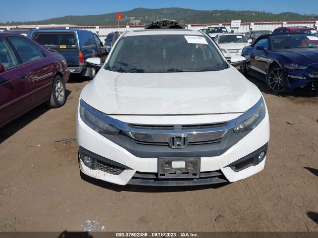 2HGFC1F9XGH636526 Honda Civic Sedan Touring
