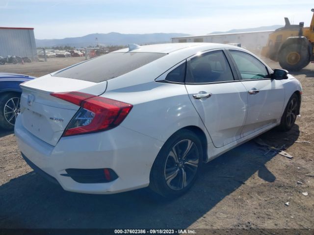 2HGFC1F9XGH636526 Honda Civic Sedan Touring