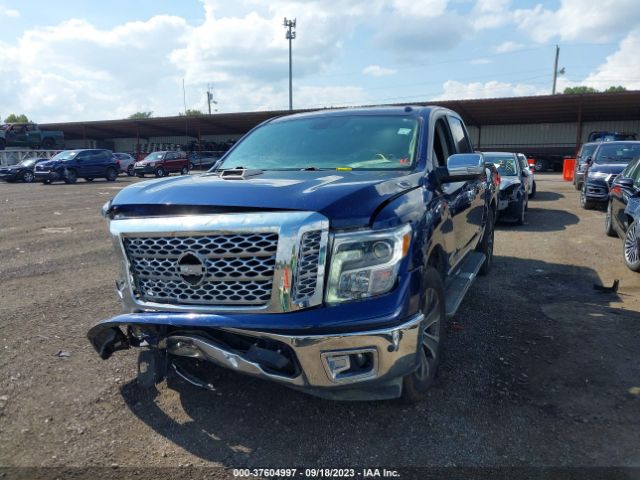 1N6AA1E67JN517933 Nissan Titan Sl