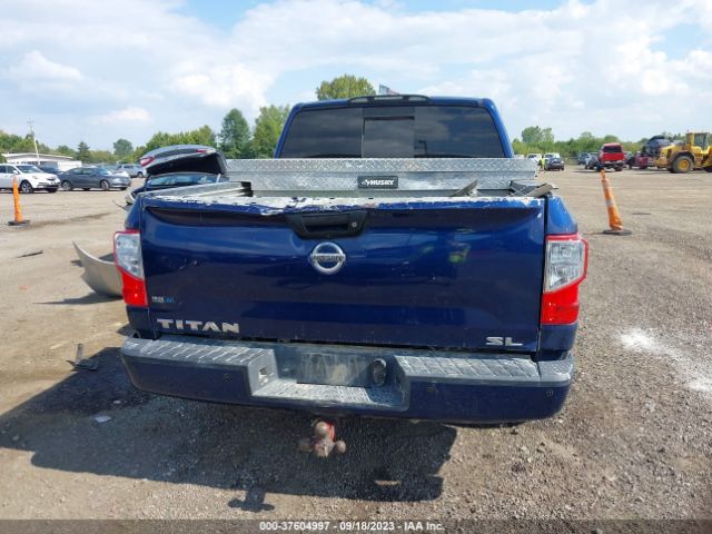 1N6AA1E67JN517933 Nissan Titan Sl
