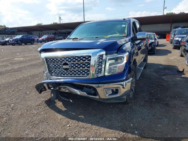 1N6AA1E67JN517933 Nissan Titan Sl
