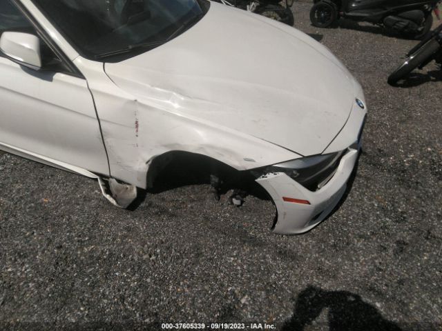 WBA3C3C53EF983657 BMW 3 Series 320i Xdrive