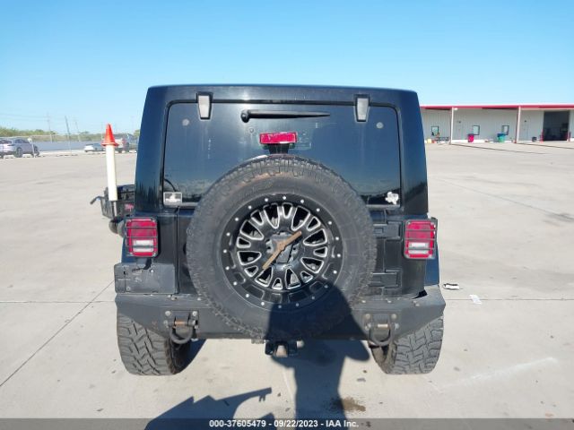 1C4HJWEG8EL126878 Jeep Wrangler Unlimited Sahara