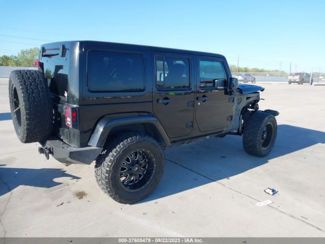 1C4HJWEG8EL126878 Jeep Wrangler Unlimited Sahara