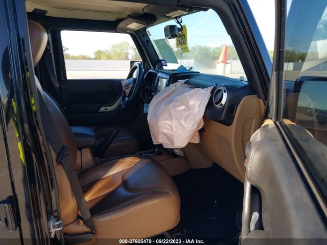1C4HJWEG8EL126878 Jeep Wrangler Unlimited Sahara
