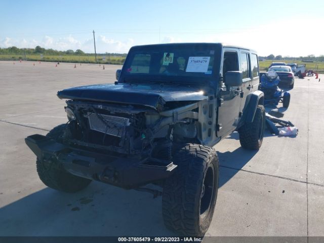1C4HJWEG8EL126878 Jeep Wrangler Unlimited Sahara