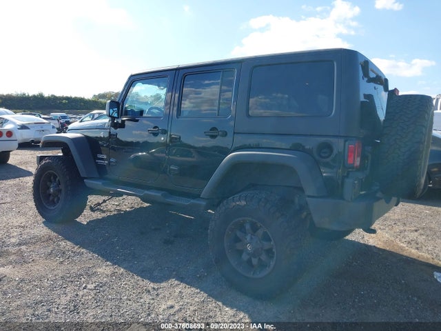 1C4BJWDG5EL321229 Jeep Wrangler Unlimited Sport