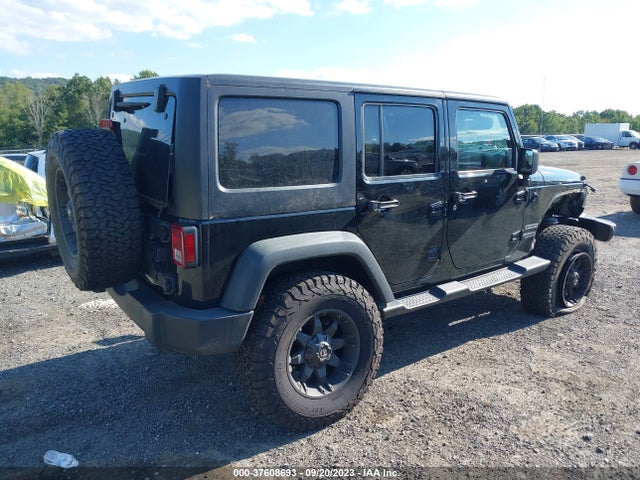 1C4BJWDG5EL321229 Jeep Wrangler Unlimited Sport