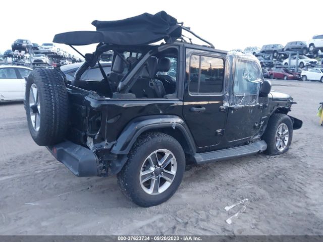 1C4HJXEN9JW326990 Jeep Wrangler Unlimited Sahara