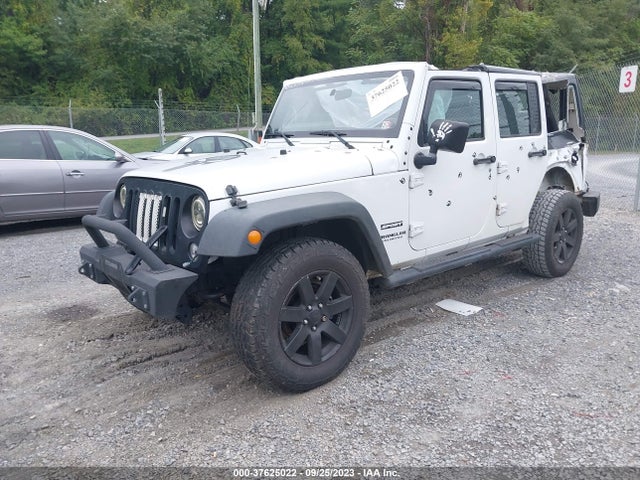 1C4BJWDG5GL201210 Jeep Wrangler Unlimited Sport