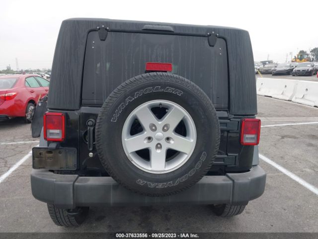 1C4GJWAG9FL698108 Jeep Wrangler Sport