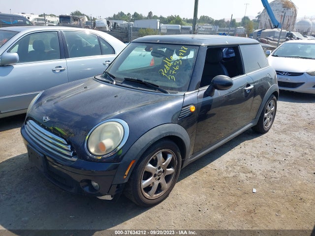 2009 MINI COOPER HARDTOP VIN: WMWMF33559TT69826