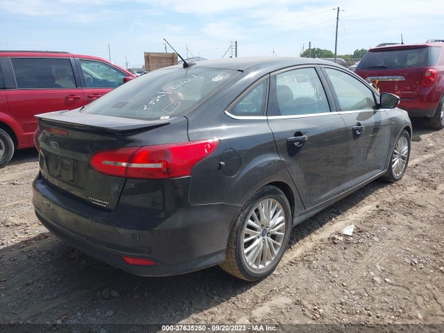 2015 FORD FOCUS TITANIUM VIN: 1FADP3J2XFL312144
