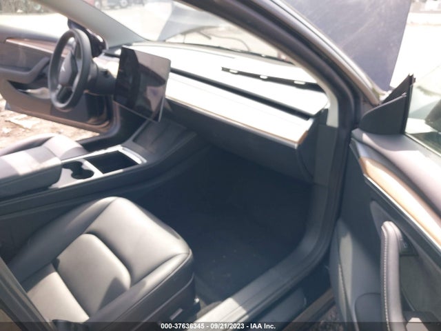 2023 TESLA MODEL 3 5YJ3E1EAXPF434993 Photo 4