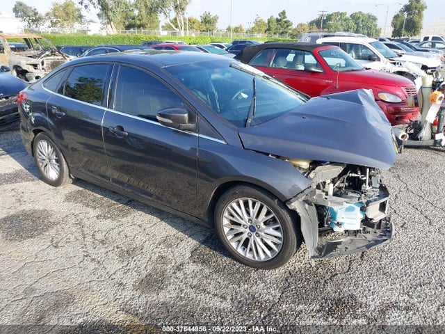 2016 FORD FOCUS TITANIUM VIN: 1FADP3J28GL275970