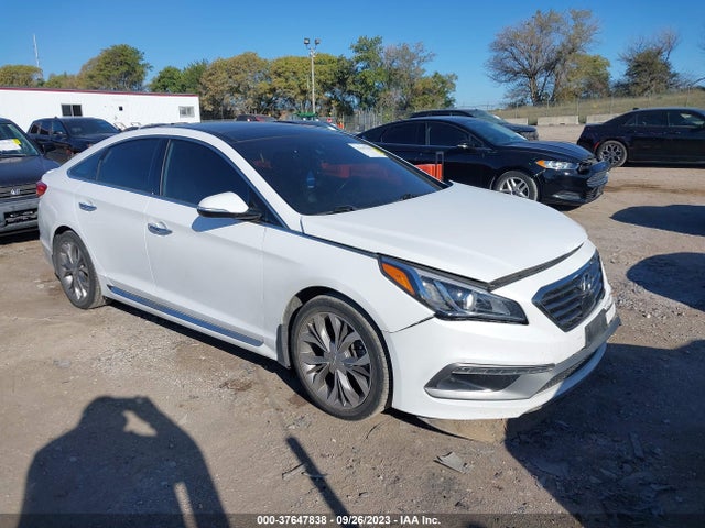 2015 5NPE34AB7FH163230 main image