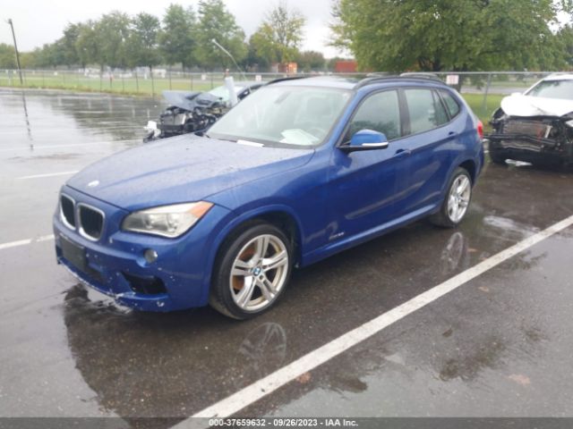 2015 BMW X1 WBAVL1C5XFVY38443 Photo 1