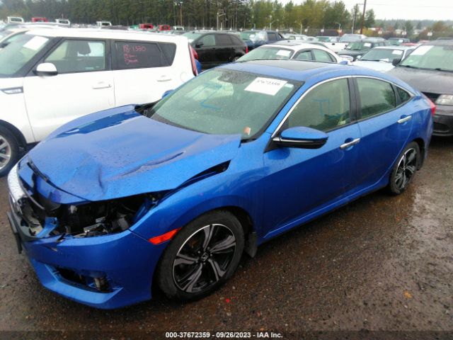JHMFC1F98JX006939 Honda Civic Sedan Touring