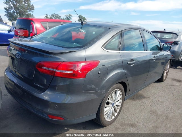 2016 FORD FOCUS TITANIUM VIN: 1FADP3J24GL399556