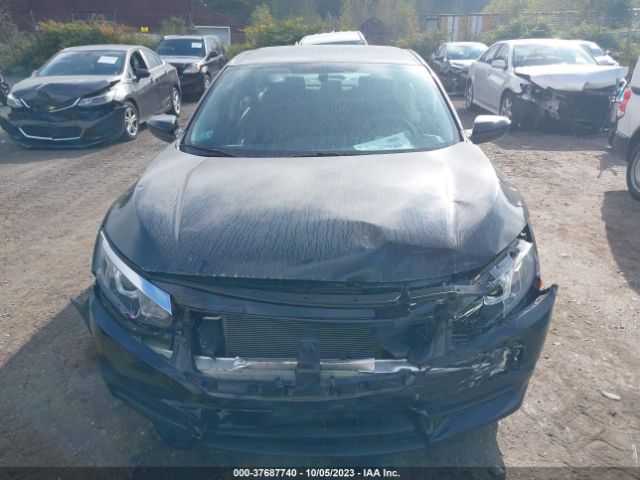 2HGFC2F58JH563117 Honda Civic Sedan Lx