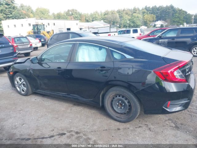 2HGFC2F58JH563117 Honda Civic Sedan Lx
