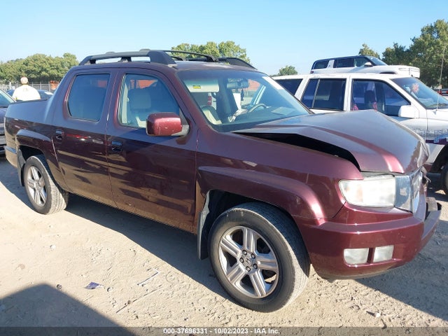 2010 HONDA RIDGELINE RTL VIN: 5FPYK1F52AB006687