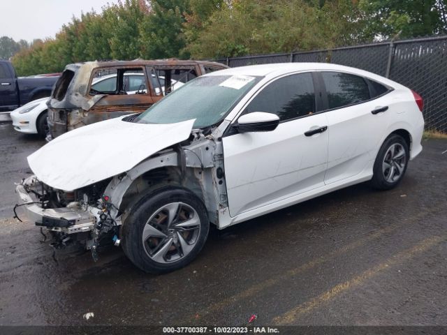 19XFC2F6XKE205201 Honda Civic Sedan Lx