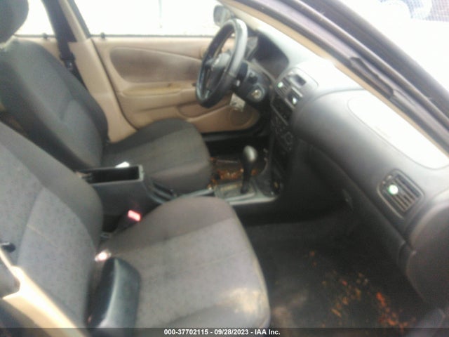 2001 TOYOTA COROLLA 1NXBR12E91Z477481 Photo 4