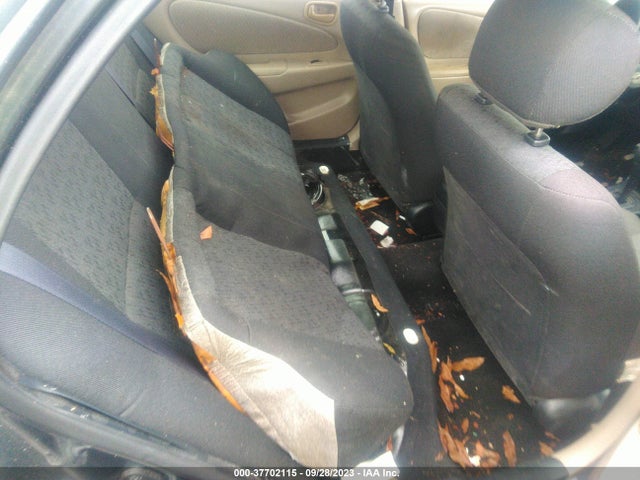 2001 TOYOTA COROLLA 1NXBR12E91Z477481 Photo 7