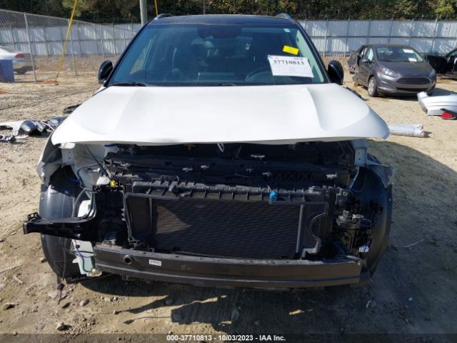 KNDEU2AA8M7056696 KIA SELTOS S