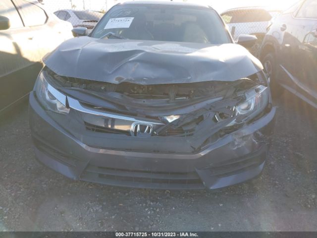 2HGFC2F59JH606024 Honda Civic Sedan Lx