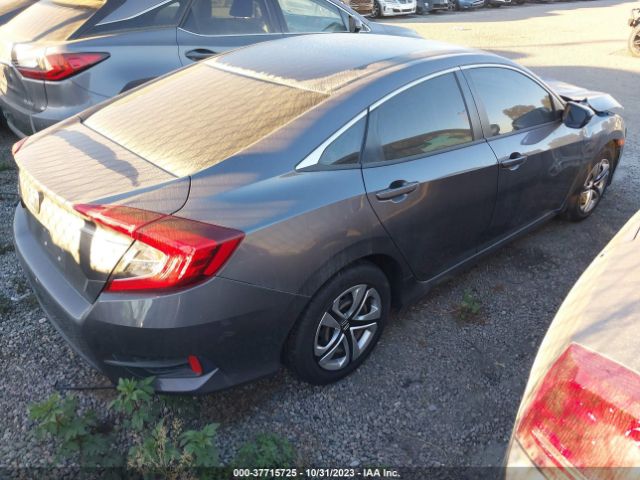 2HGFC2F59JH606024 Honda Civic Sedan Lx