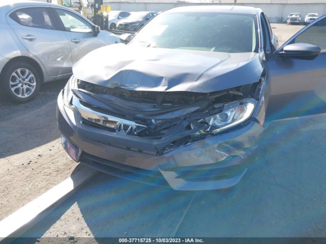 2HGFC2F59JH606024 Honda Civic Sedan Lx