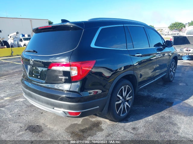 Honda Pilot Touring 7-passenger 2022 5FNYF5H62NB013395 Image 4