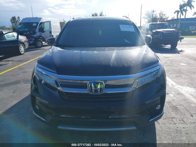 Honda Pilot Touring 7-passenger 2022 5FNYF5H62NB013395 Image 6