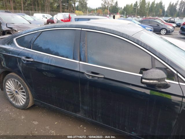 3FA6P0K94ER270928 Ford Fusion Titanium