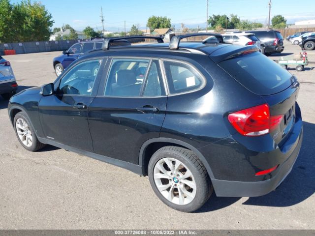 2014 BMW X1 WBAVL1C5XEVY24105 Photo 2