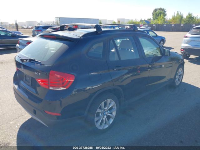 2014 BMW X1 WBAVL1C5XEVY24105 Photo 3
