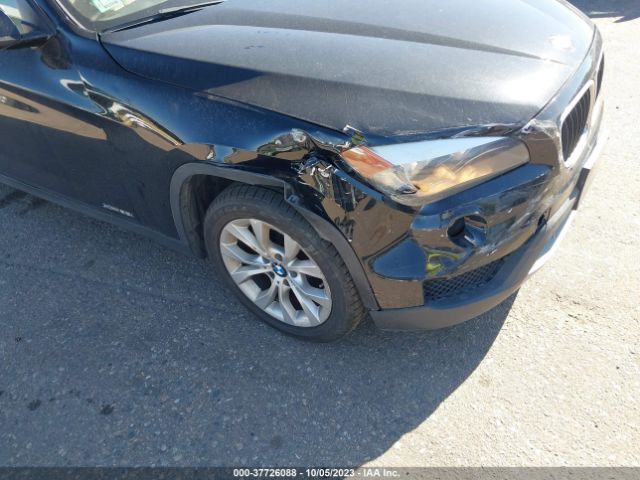 2014 BMW X1 WBAVL1C5XEVY24105 Photo 5
