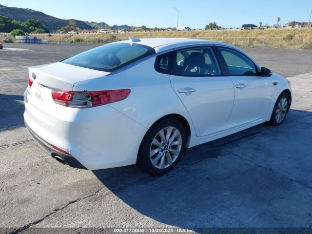 5XXGT4L35JG258596 KIA Optima Lx