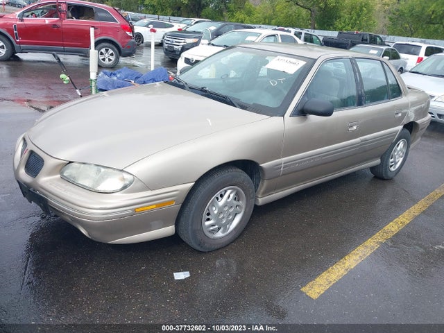 1997 PONTIAC GRAND AM SE VIN: 1G2NE52T4VC717037