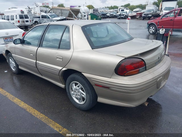 1997 PONTIAC GRAND AM SE VIN: 1G2NE52T4VC717037