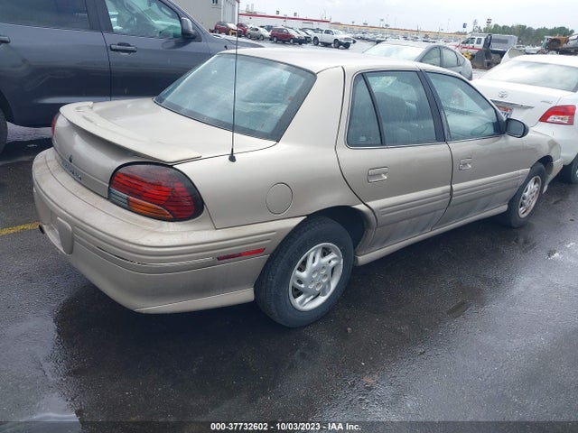 1997 PONTIAC GRAND AM SE VIN: 1G2NE52T4VC717037